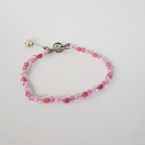 Pink Bracelet with Flower Charm